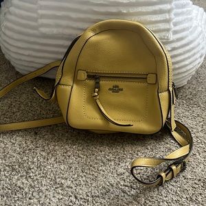 Beautiful light mustard yellow Coach convertible back pack/crossbody